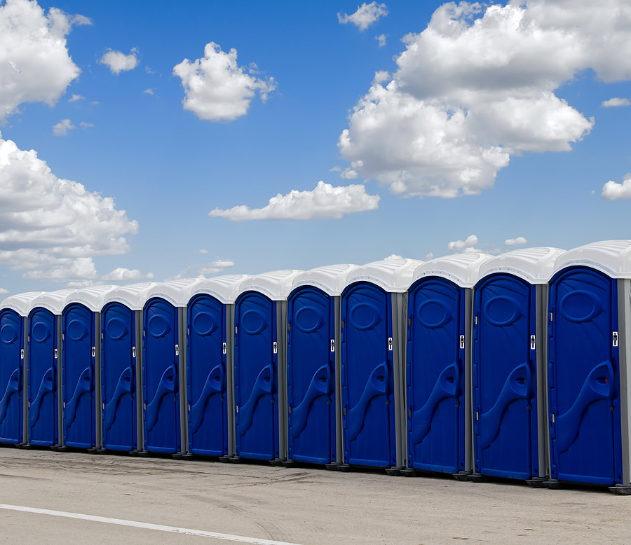newly painted portable toilets